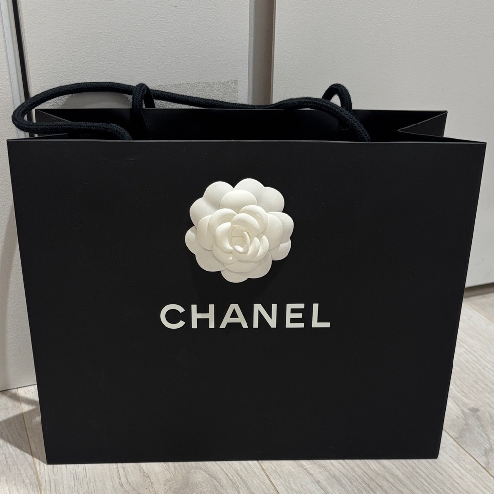 Chanel Black Tote with White Floral Accent